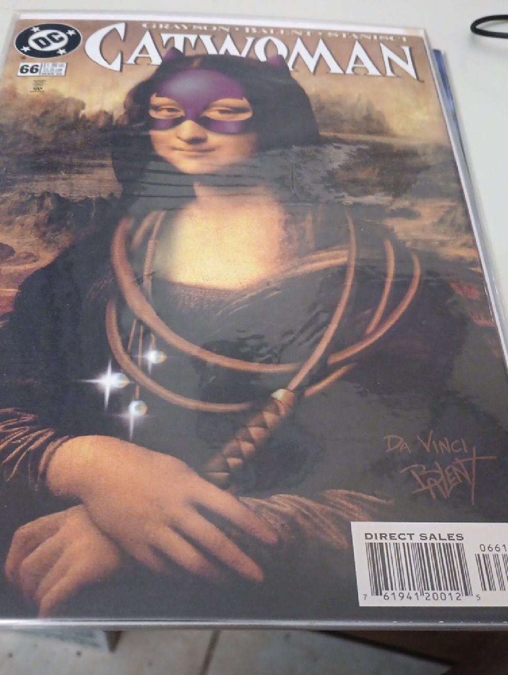 DC Catwoman Comic Cover Featuring Mona Lisa with Purple Mask